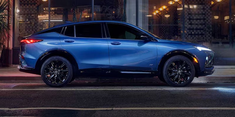 Dark blue 2026 Buick Envista driving downtown near Poughkeepsie, NY