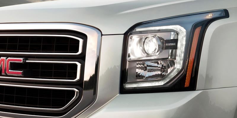 Left Headlight of GMC car
