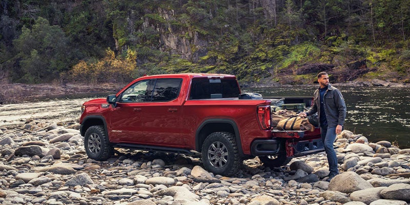 Red 2026 Sierra 1500 near river in Poughkeepsie, NY