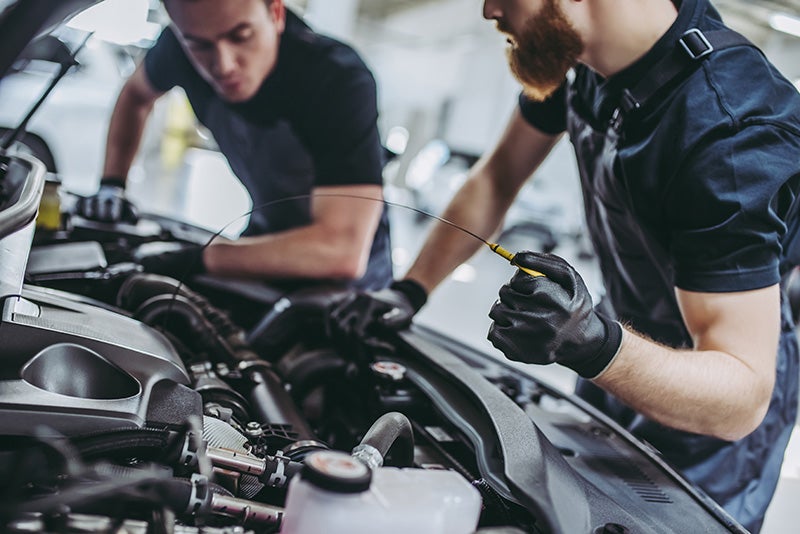 Service technicians working on vehicle - Hudson Buick GMC in Poughkeepsie, NY